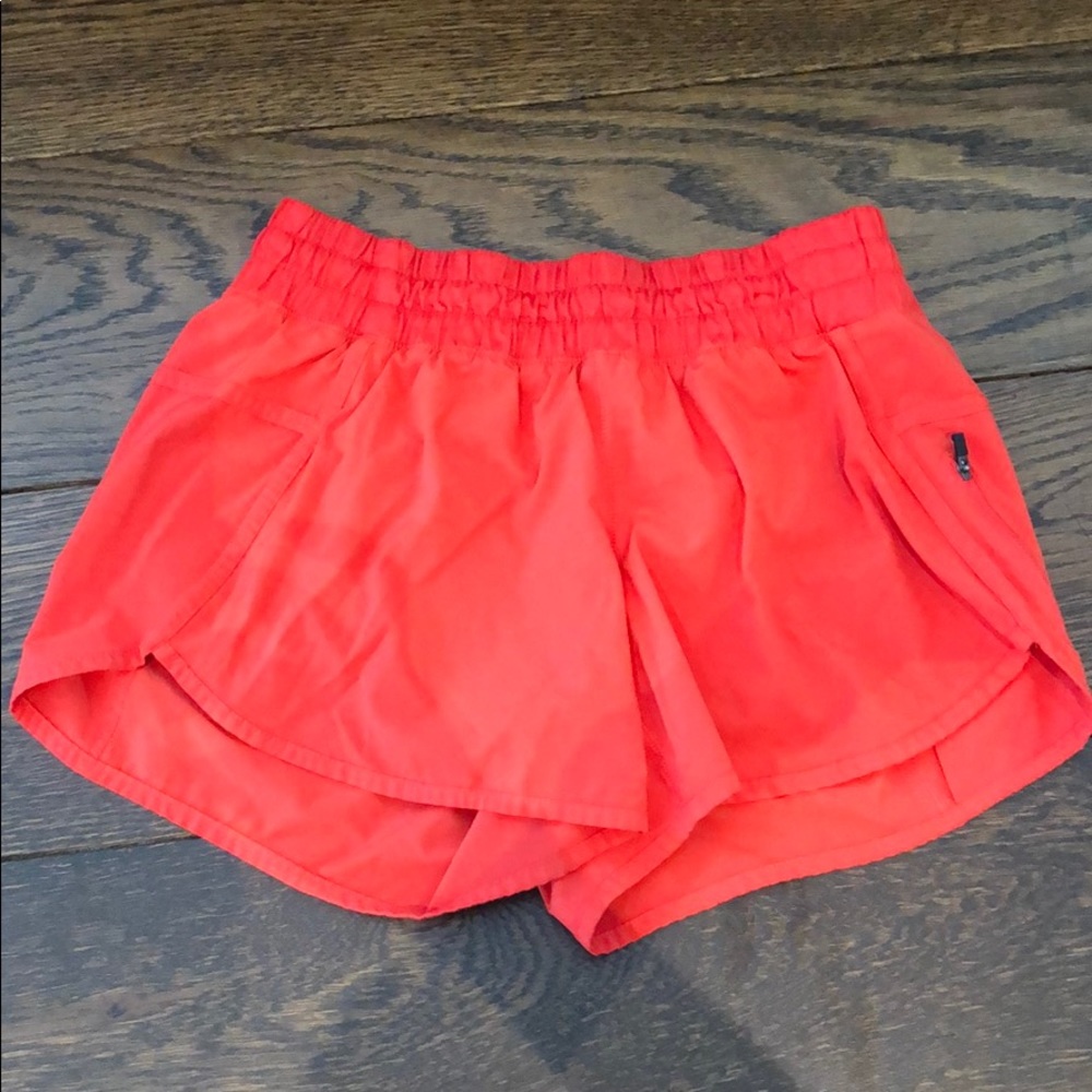 Lululemon orange shorts w/liner size 8  4” inseam